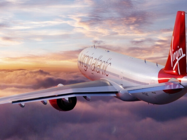 Virgin Atlantic A330 passenger jet in flight, gliding through the air