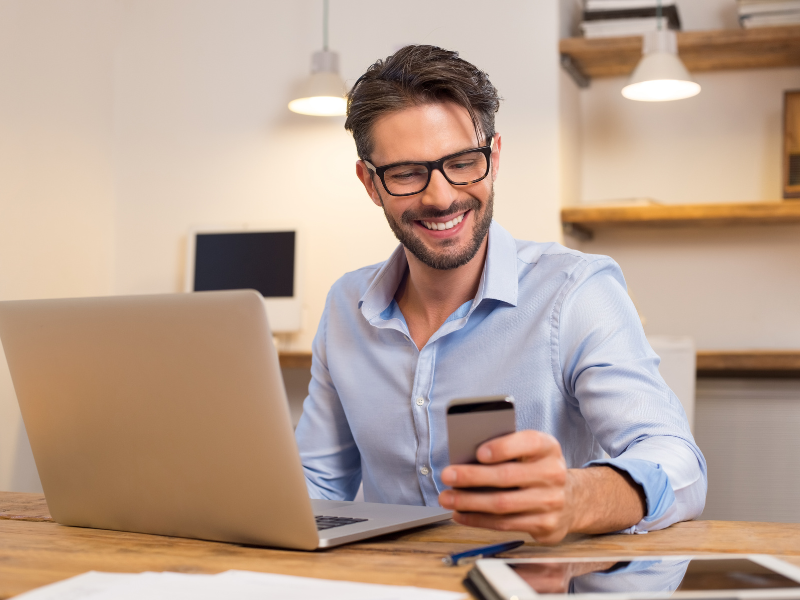 Candidate browsing on phone looks happy